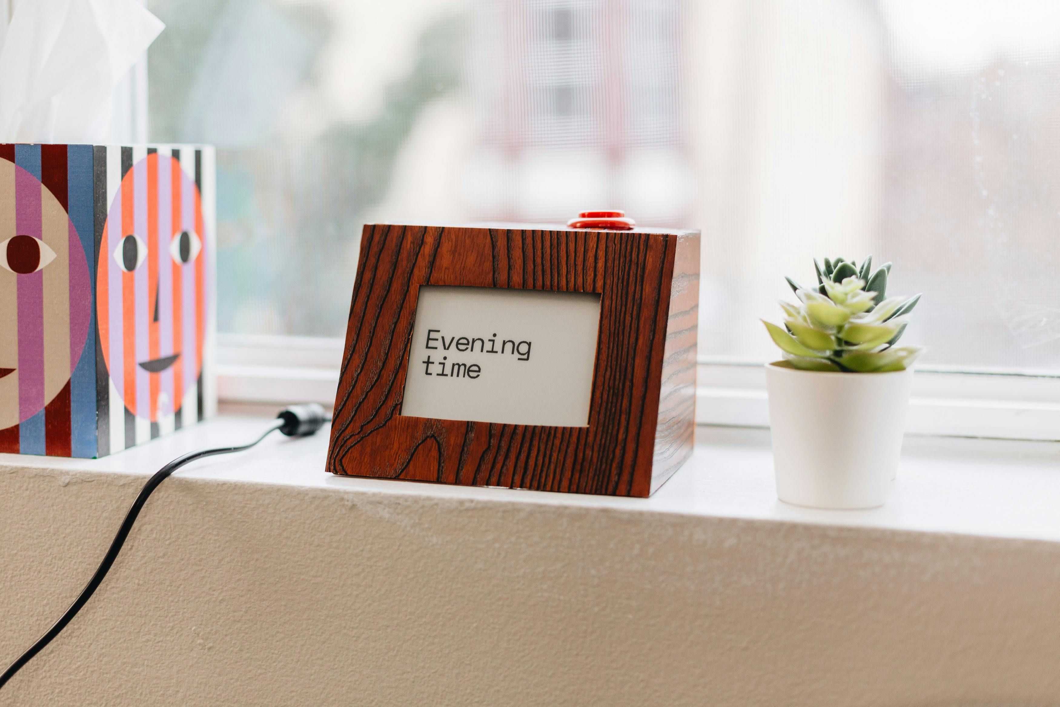 The fuzzy clock displaying "Evening Time