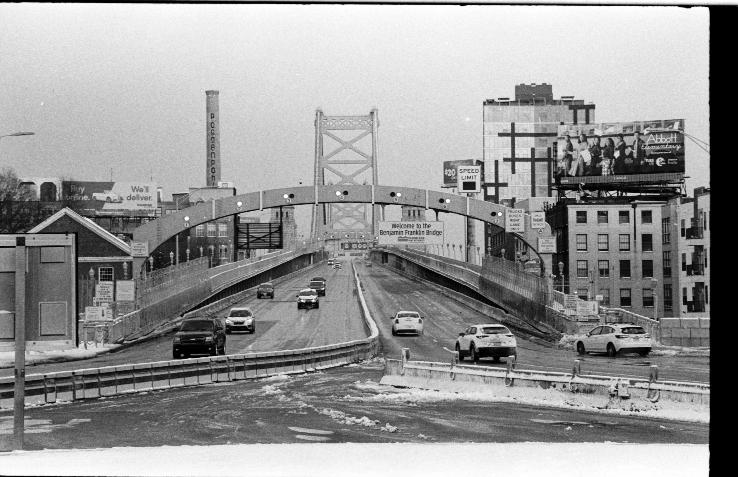 Ben Franklin bridge with clear sky above.